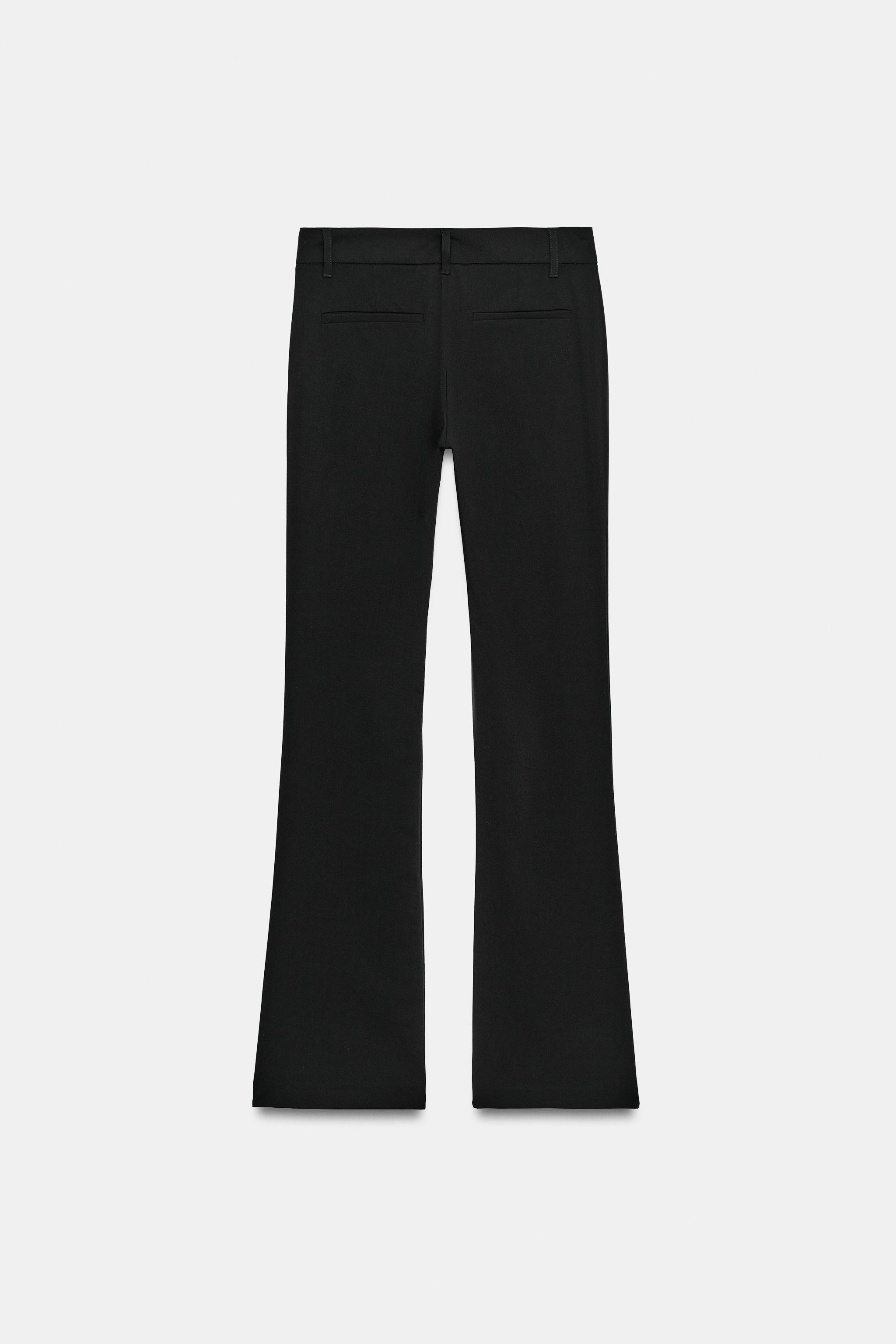 PANTALON FLARE À PASSANTS